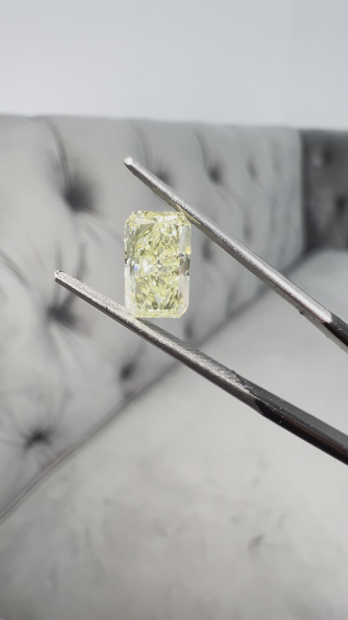 Elongated fancy intense yellow diamond radiant cut. Long yellow diamond radiant cut. Long radiant diamond. Fancy intense yellow. 