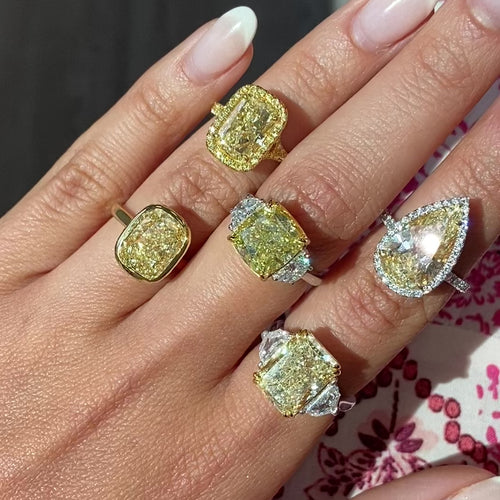 5.62ct Fancy Yellow Cushion Diamond Three Stone Ring