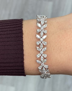 Elegant white diamond bracelet. tennis bracelet. floral diamond bracelet.