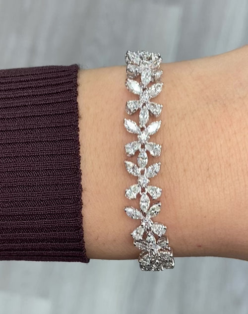 Elegant white diamond bracelet. tennis bracelet. floral diamond bracelet.