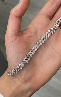 Fancy pink and white pear shape diamond double row bracelet with VS-SI clarity.