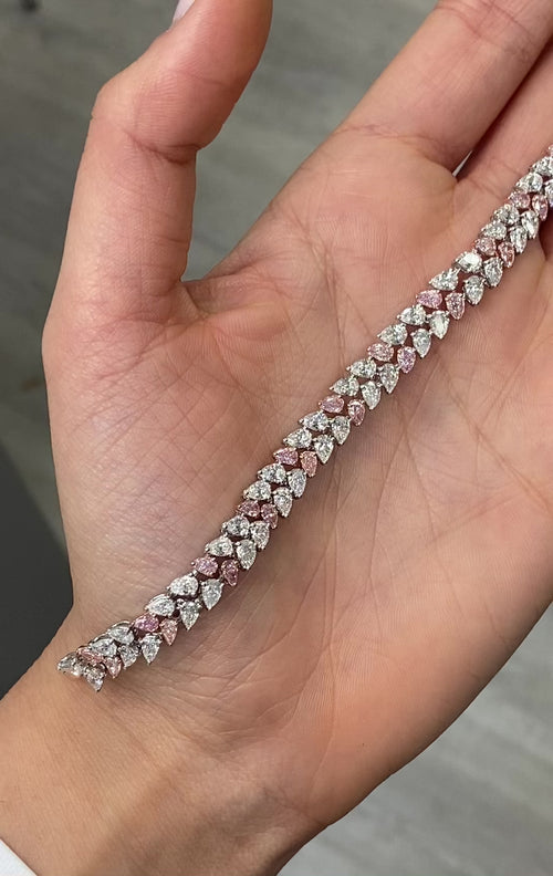 Fancy pink and white pear shape diamond double row bracelet with VS-SI clarity.