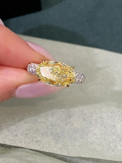 4 Carat Fancy Yellow Oval Diamond East West Pavé Engagement Ring