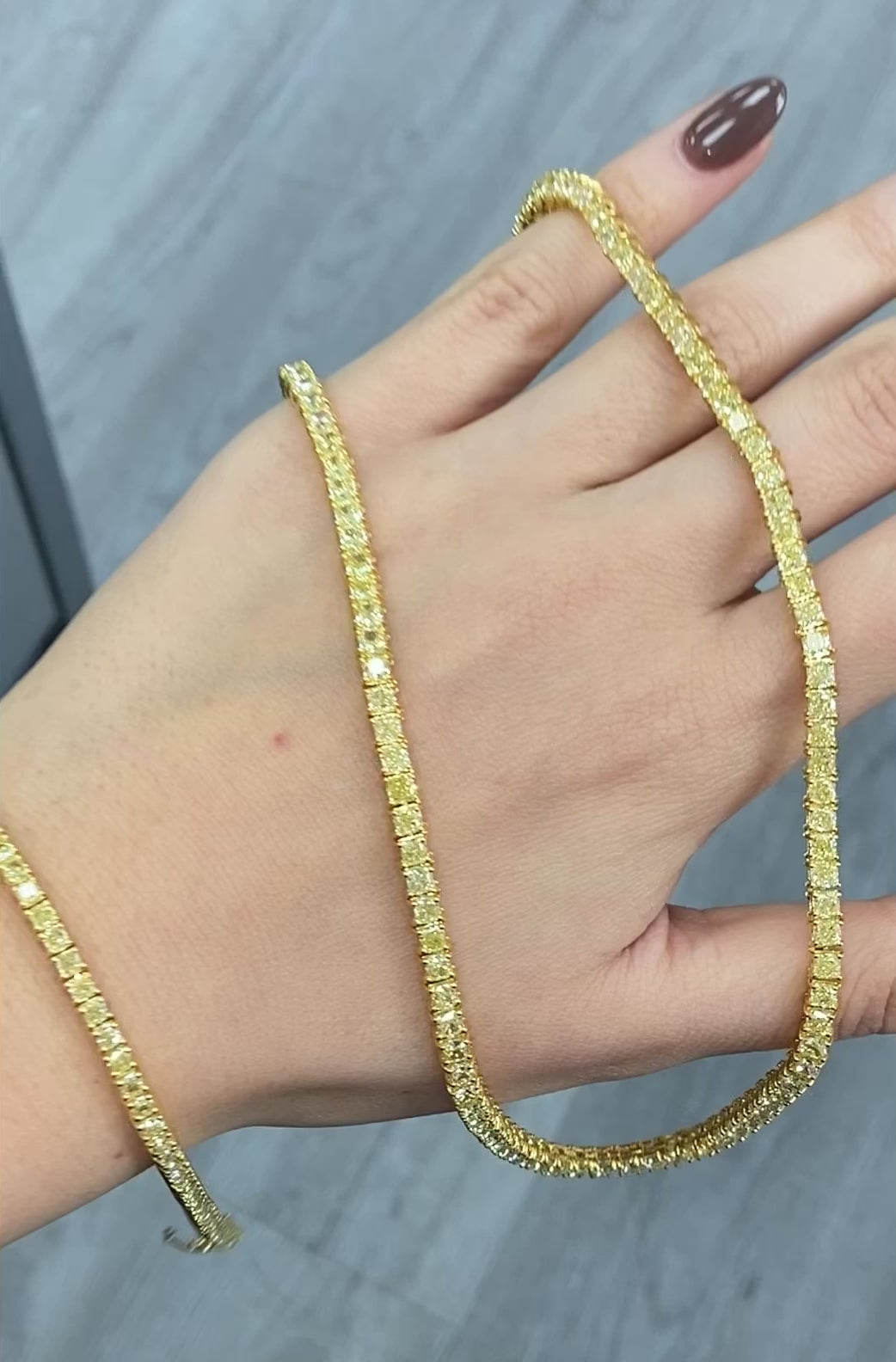 Elegant fancy yellow diamond tennis necklace featuring natural yellow diamond jewelry design with a VS-VVS clarity.