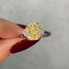 elongated radiant cut yellow diamond ring video on hand 
