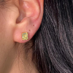 GIA certified fancy yellow diamond studs radiant video
