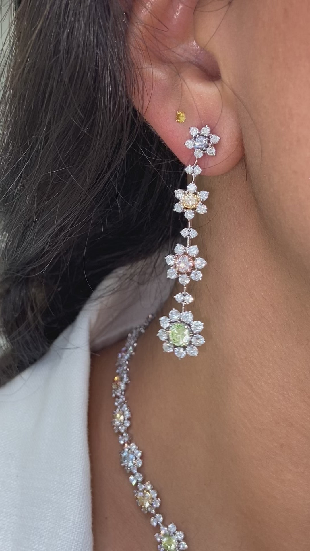 Unique multicolor flower shaped natural diamond earrings.