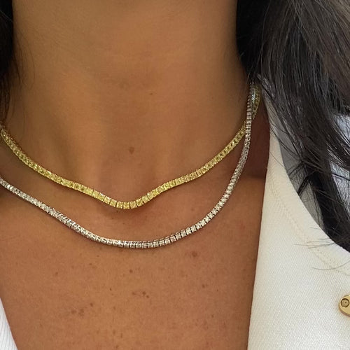 Natural intense yellow diamond tennis necklace with cushion cut diamonds set in 18k yellow gold.