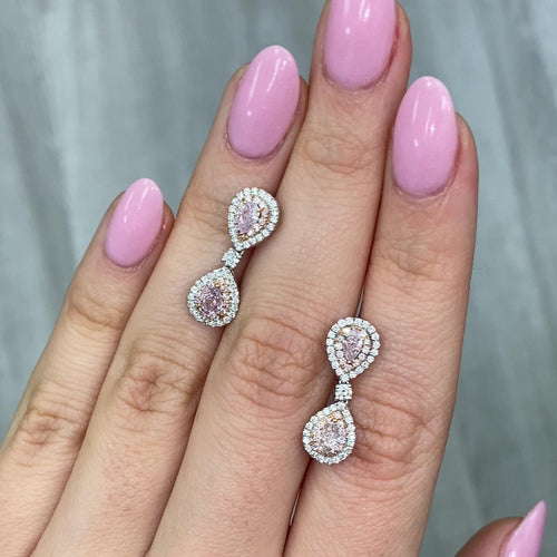 Unique pink diamond earrings. pink pear shape diamonds. pink diamonds.