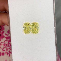 1.84ct and 1.80ct Fancy Intense Yellow Elongated Cushion Cut Diamonds