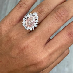 Unique peach color diamond ring, pear shaped, GIA certified. 