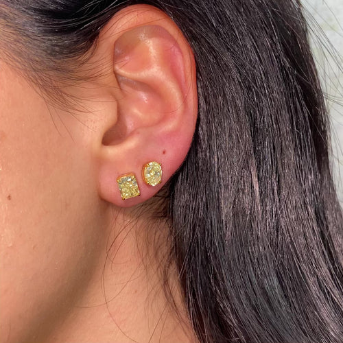 GIA certified fancy yellow diamond studs radiant and oval video 