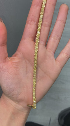 Natural yellow diamond bracelet, yellow diamond bracelet, diamond tennis bracelet, yellow diamond tennis bracelet, cushion cut diamonds, yellow cushion cut diamonds, yellow cushion tennis bracelet.