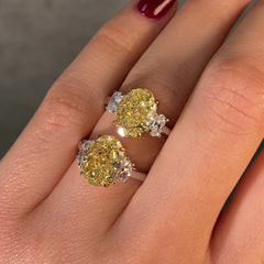 Video of 2 oval yellow diamond engagement rings 
