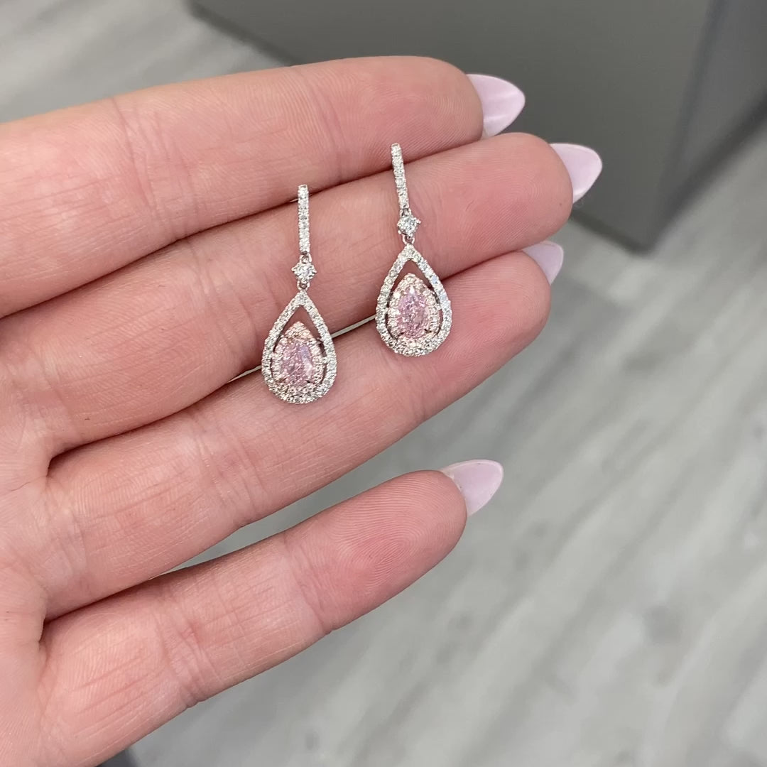 pink diamond pear shape earrings with white diamonds. Pink diamond earrings