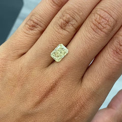 Elongated radiant yellow diamond, fancy light yellow natural diamond, natural canary diamond.