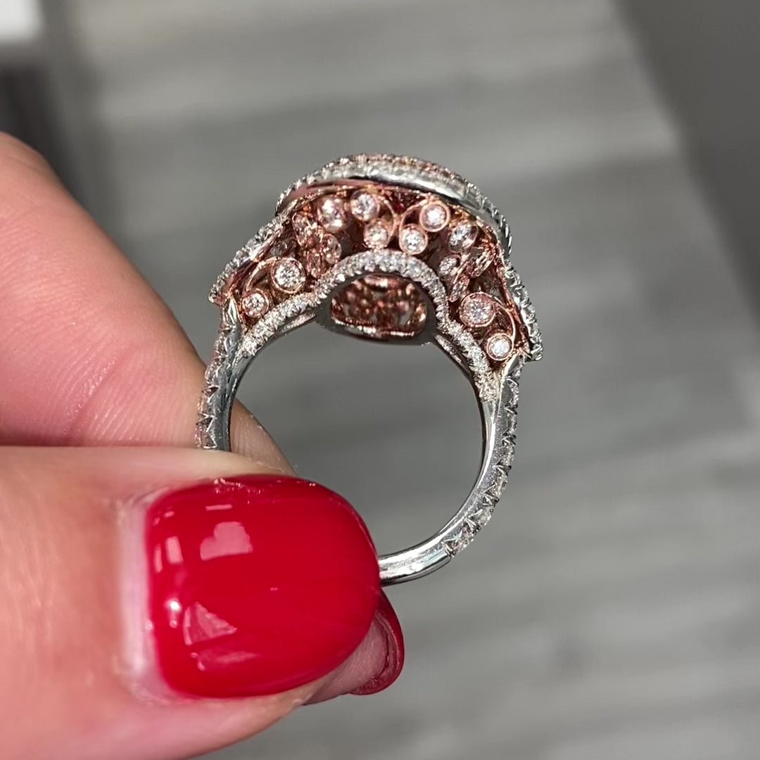 Unique green marquise cut diamond ring featuring a GIA certified diamond.