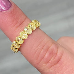 Oval diamond eternity ring. Yellow diamond oval eternity ring. Yellow diamond band. Canary diamond band. Yellow oval diamonds. Fancy yellow oval diamond ring. Yellow diamond stackable rings.