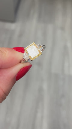 Fancy yellow elongated cushion diamond ring. Fancy yellow long cushion. Fancy yellow cushion