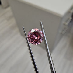 Natural fancy intense pink diamond, rare round pink diamond.