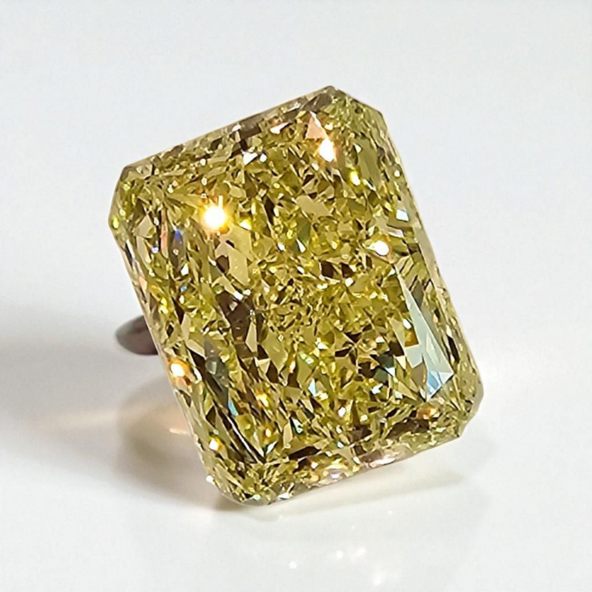 GIA 5.07ct Fancy Intense Yellow Elongated Radiant diamond loose stone at Rare Colors by Namdar, 5th Avenue New York
