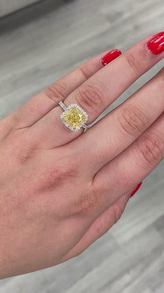 yellow diamond ring. yellow diamond. fancy yellow diamond. yellow diamond engagement ring. yellow diamond halo ring. canary diamond ring. yellow diamond jewelry. GIA certified yellow diamond.