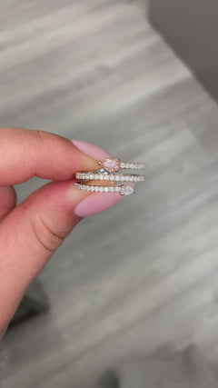 pink diamond ring. pink diamond spiral ring. pink pear diamond