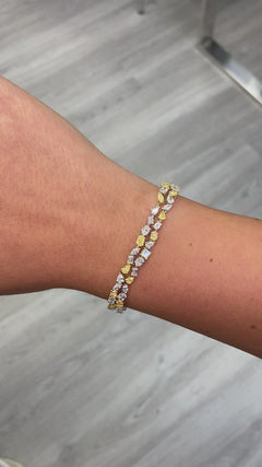 Fancy intense yellow diamond bracelet. Yellow diamond multi shape bracelet. Yellow diamond tennis bracelet. Canary diamond bracelet. Yellow diamond mutl shape. Natural yellow diamond bracelet.