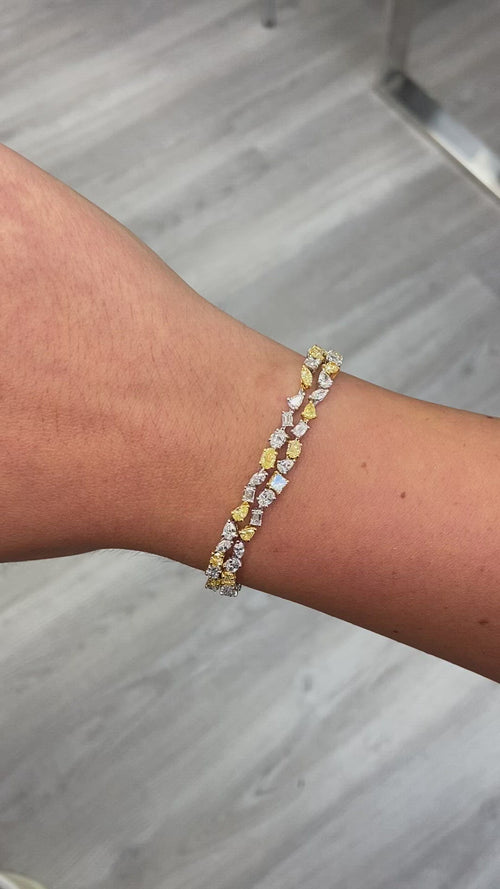 Fancy intense yellow diamond bracelet. Yellow diamond multi shape bracelet. Yellow diamond tennis bracelet. Canary diamond bracelet. Yellow diamond mutl shape. Natural yellow diamond bracelet.