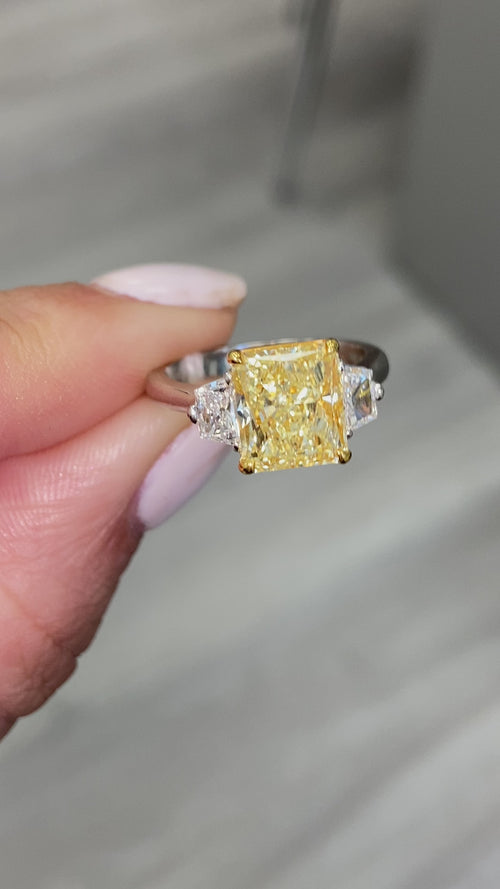 3 carat yellow diamond. yellow diamond ring. yellow diamond 3 stone ring. yellow diamond radiant cut. fancy yellow diamond. Buy yellow diamonds.