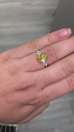 Intense oval diamond ring. Intense yellow diamond. Gia certified intense yellow diamond. Oval diamond ring. Yellow diamond engagement ring. Yellow diamond rings. Yellow diamond jewelry.
