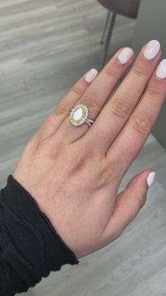 yellow diamond oval ring. yellow diamond halo ring. 4 carat yellow ring. oval yellow diamond. yellow diamond oval shape.