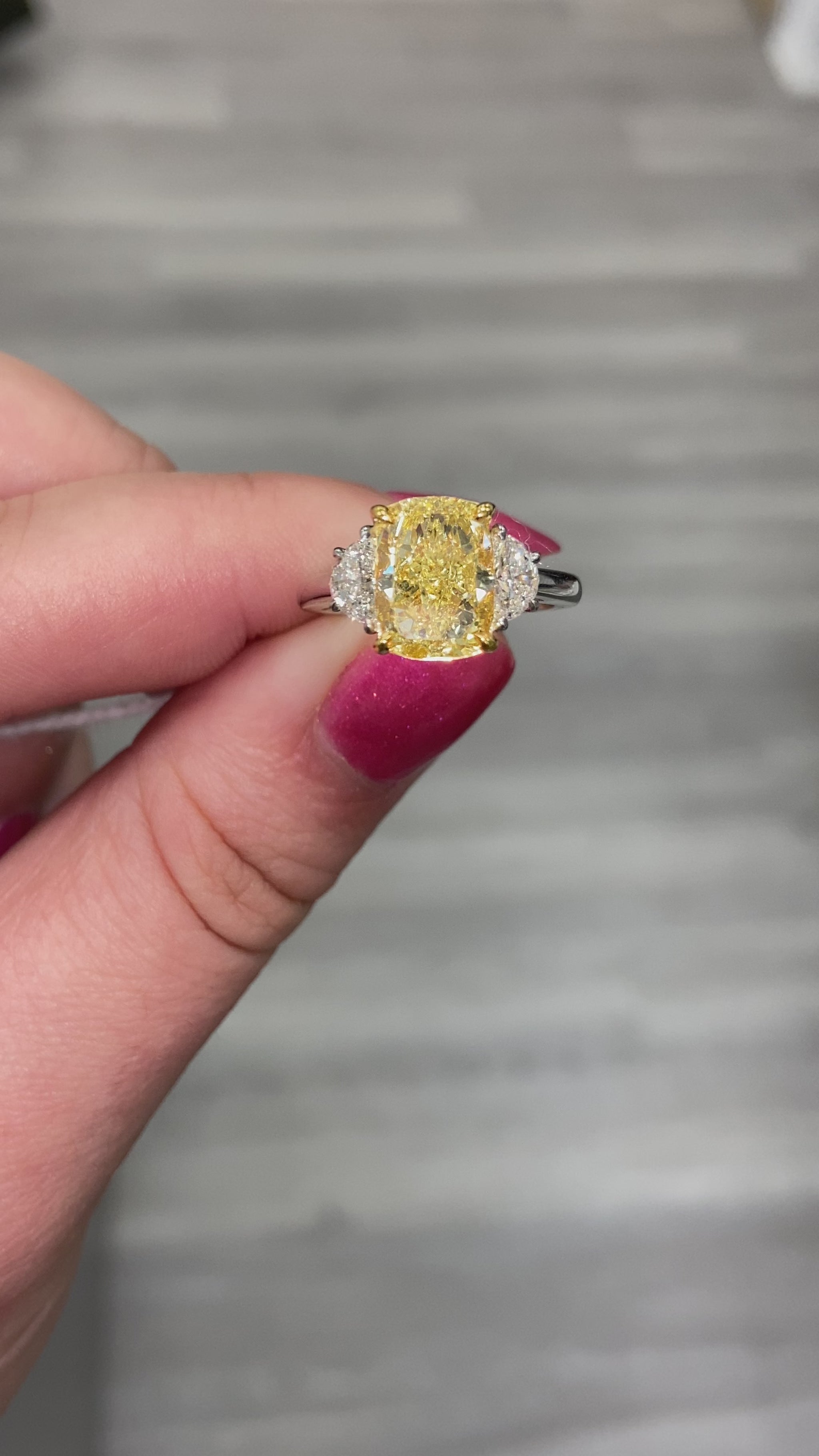 Fancy yellow diamond ring. Fancy yellow cushion cut diamond. Canary yellow diamond ring. Yellow diamond engagement ring. Canary engagement ring. Big yellow diamond ring. Gia certified yellow diamond ring.