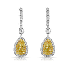 Old money yellow diamond earrings with pear shaped stones and VS-SI clarity.