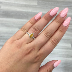 orange diamond ring. orange pear shape diamond