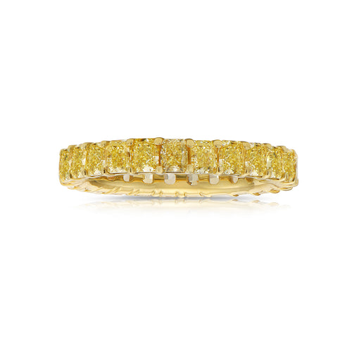 Fancy yellow eternity ring. Yellow diamond eternity band. Yellow diamond wedding band. Yellow diamond ring. Yellow diamond jewelry.