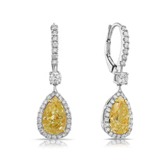 Old money yellow diamond earrings with pear shaped stones and VS-SI clarity.