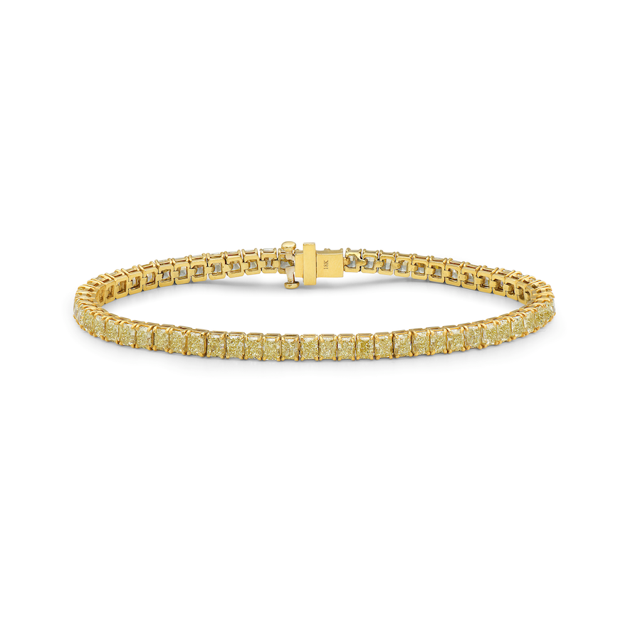 Fancy yellow diamond bracelet. Cushion diamond bracelet. Cushion tennis bracelet. Yellow diamond jewelry. Yellow tennis bracelet. Natural yellow diamonds.