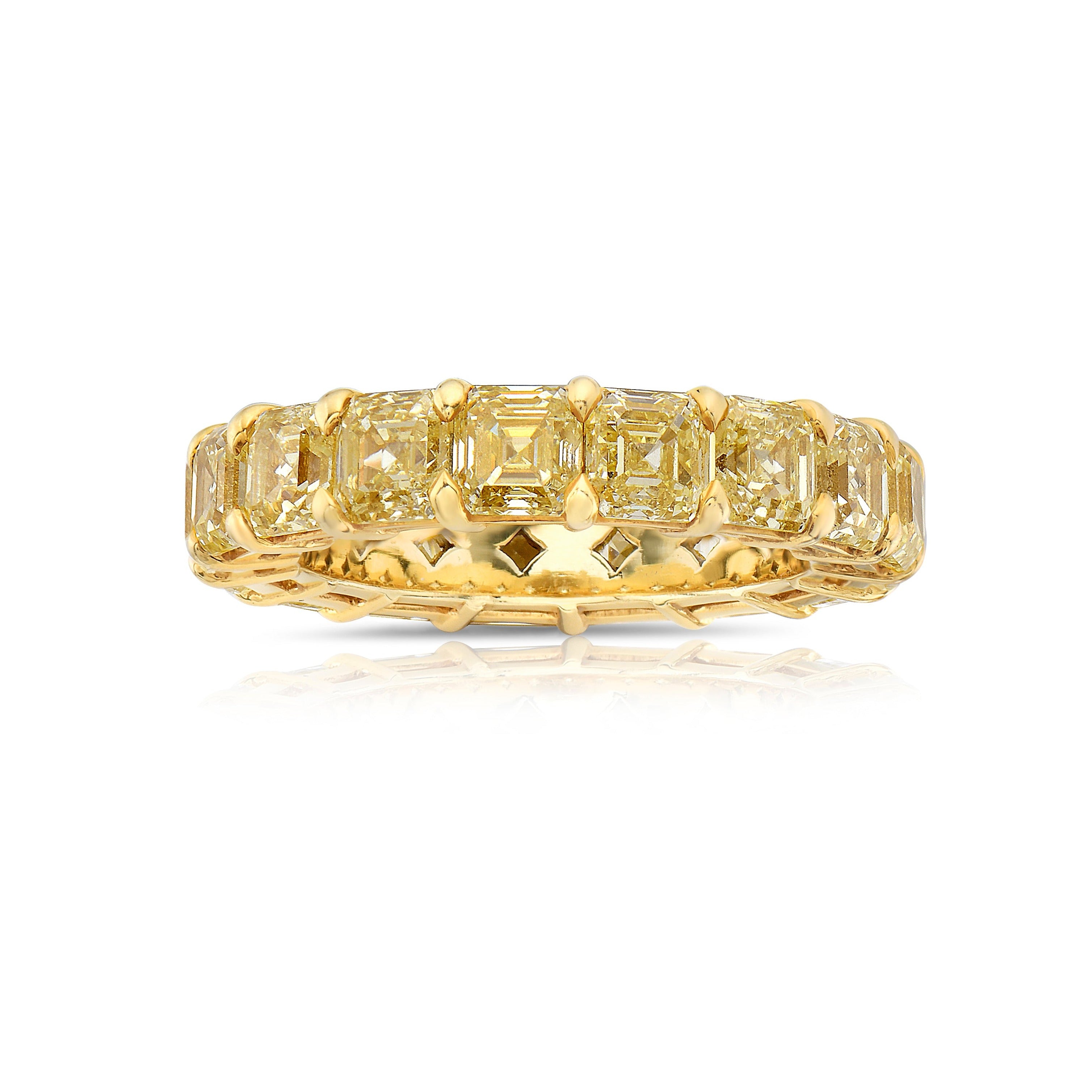 Fancy yellow diamond asscher cut eternity band. asscher cut diamonds. yellow asscher cut diamonds. Diamond eternity ring. Diamond wedding band. Yellow diamond jewelry. 