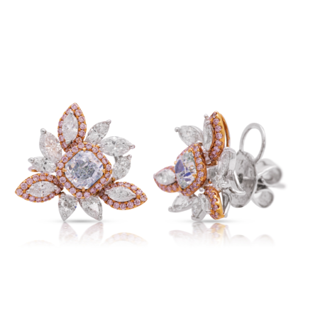 Fancy cluster diamond studs with light bluish green cushions, fancy pink accents, and platinum rose gold setting.