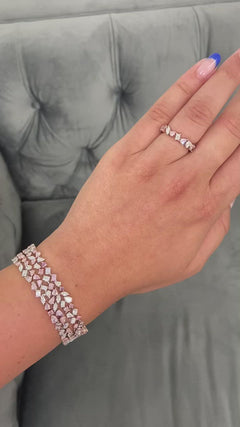 Unique natural light pink and white diamond eternity band.