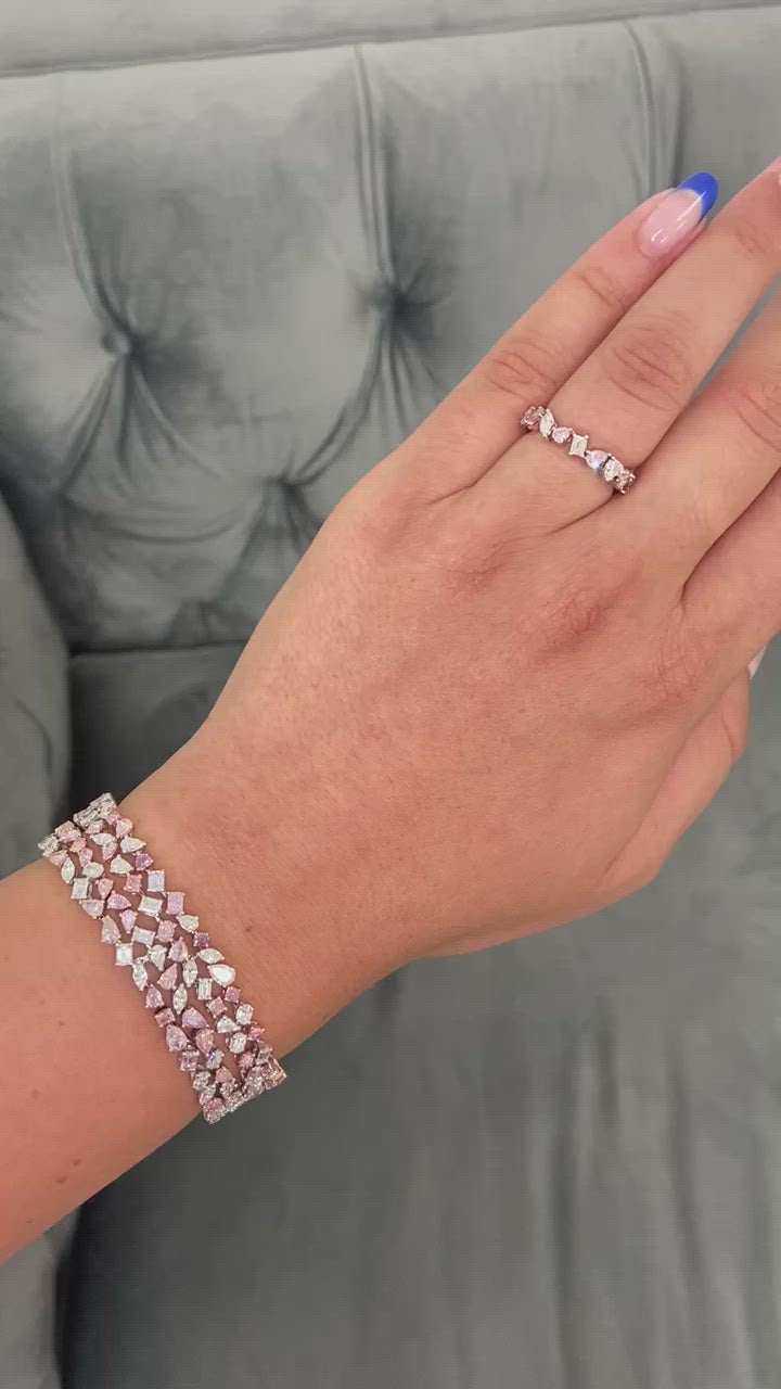 Unique natural light pink and white diamond eternity band.