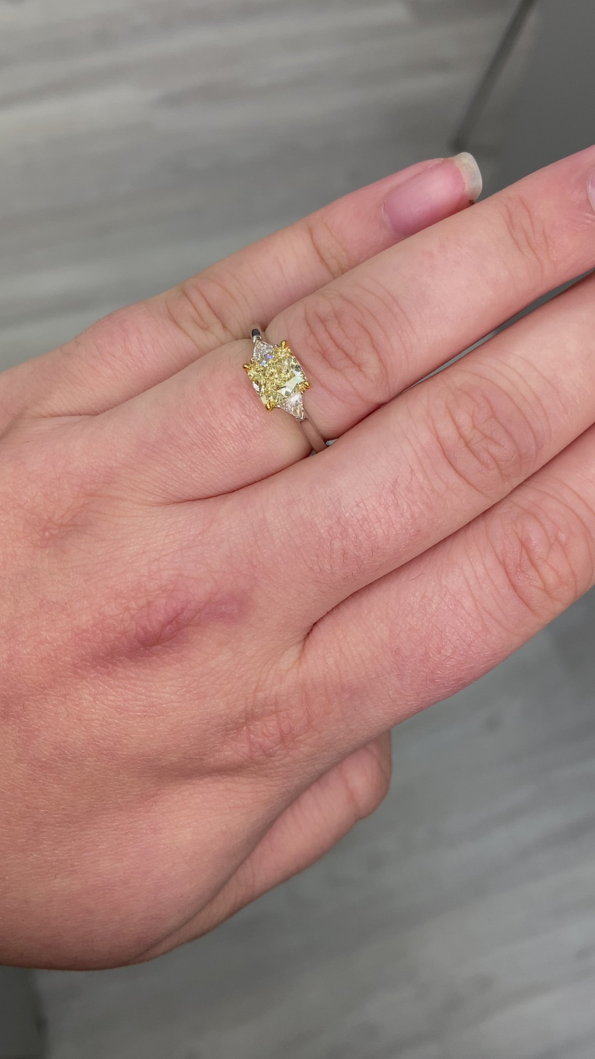 yellow diamond ring. yellow cushion cut diamond
