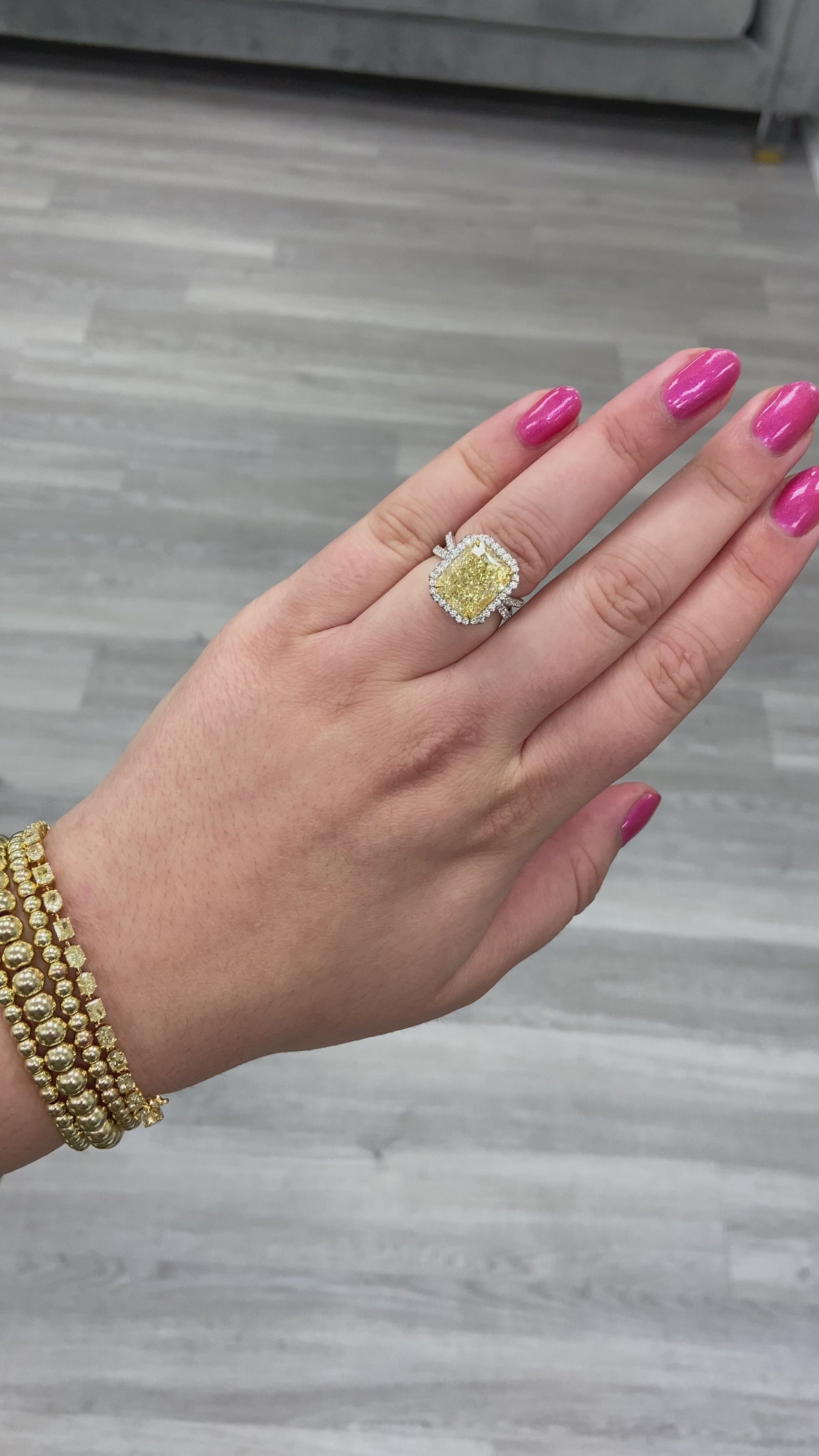 9 carat yellow diamond ring. Diamond ring set with a halo. Yellow diamond engagement ring. Yellow diamond wedding ring. Yellow diamond radiant. Yellow diamond ring.